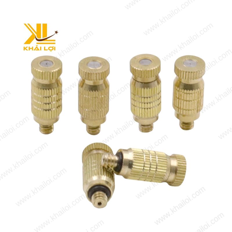 Cấu tạo chi tiết bên trong của một chiếc béc phun sương đồng, lộ ra lò xo chống nhỏ giọt và lưới lọc.