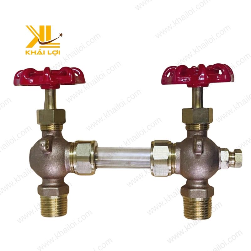 Hình ảnh một ống thủy tinh đang được lắp vào bộ van công nghiệp.